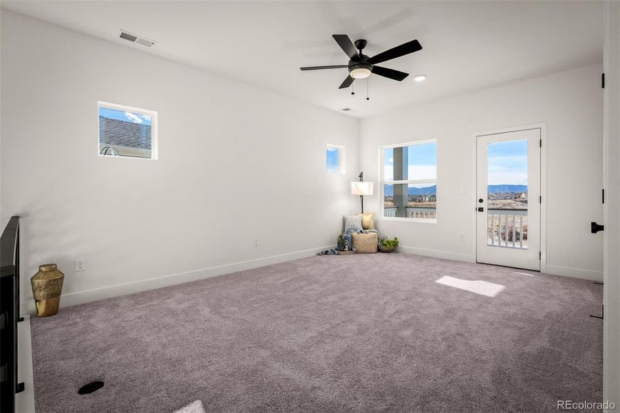 Spacious, unfurnished interior of a new home in Revel Crossing at Wolf Ranch - The Panorama Collection, Colorado Springs (Image 28).