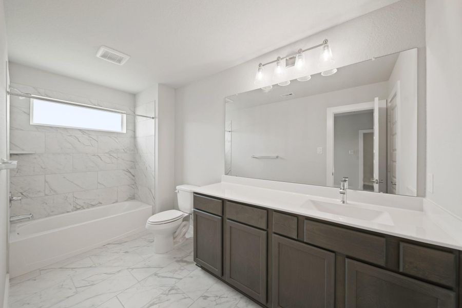 Furnished interior view inside a new home in Beacon Hill, Waller (Image 4). Furnished interior view inside a new home in Beacon Hill, Waller (Image 4).