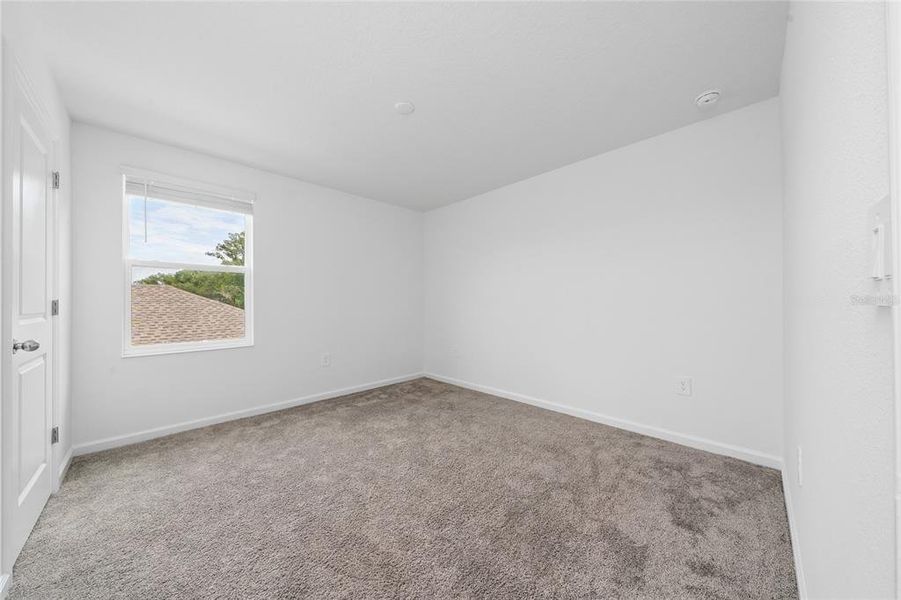 Spacious, unfurnished interior of a new home in Storey Creek, Kissimmee (Image 14).