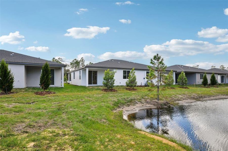 Exterior details and patio area of a home in Ridgehaven - Villas, Ormond Beach (Image 22).