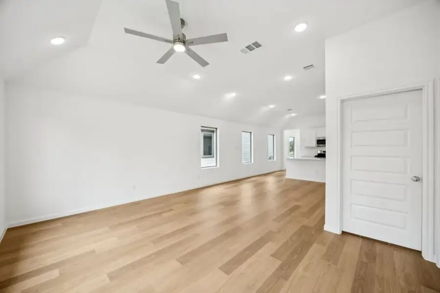 Living Room in the Spruce home plan by Trophy Signature Homes - REPRESENTATIVE PHOTO