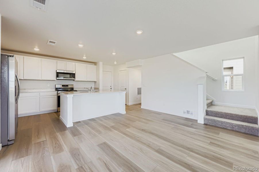 Spacious, unfurnished interior of a new home in Percheron: The Explorer Collection, Colorado Springs (Image 8).