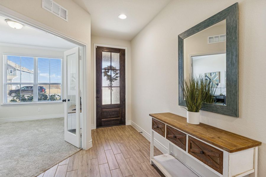 Entry showing office/flex room