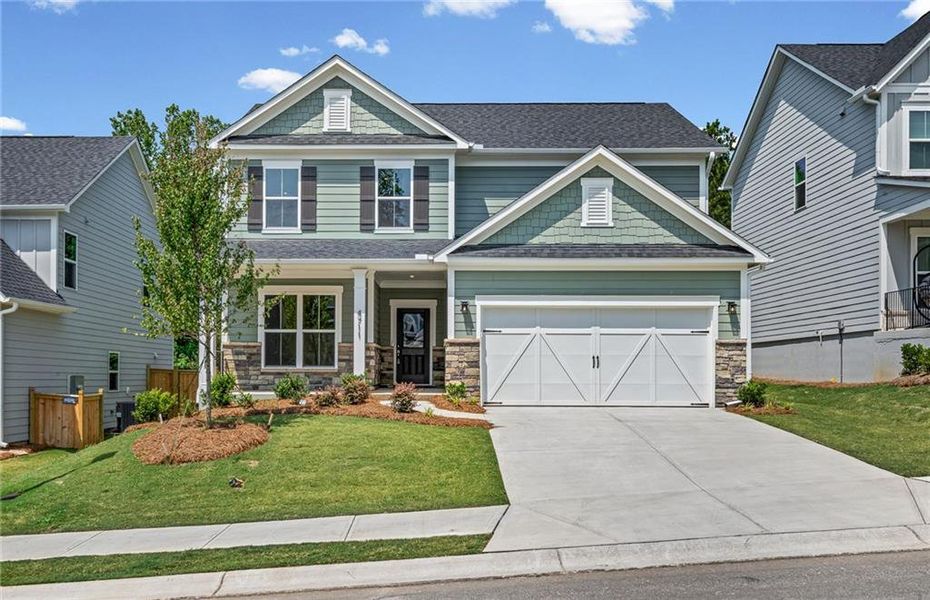 Front exterior of a new home in Hunters Creek, Flowery Branch, GA, highlighting curb appeal (Image 18).