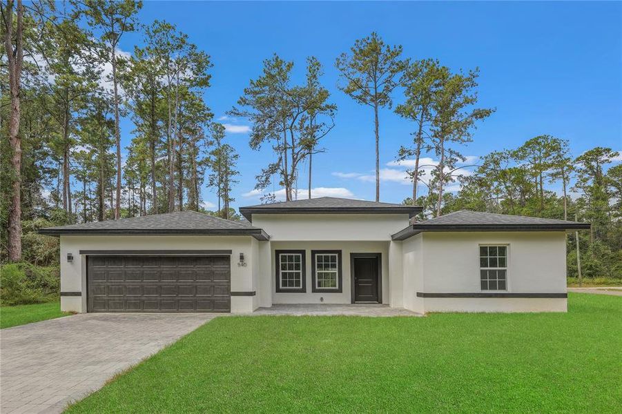 Front exterior of a new home in , Ocala, FL, highlighting curb appeal (Image 24). Front exterior of a new home in , Ocala, FL, highlighting curb appeal (Image 24).