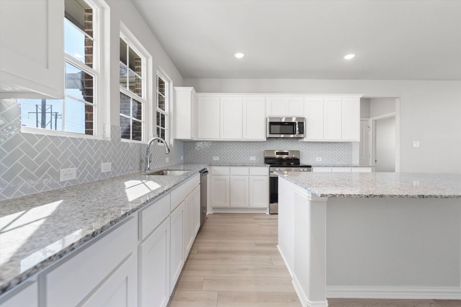 Furnished interior view inside a new home in Clear Sky Addition, Valley View (Image 9).