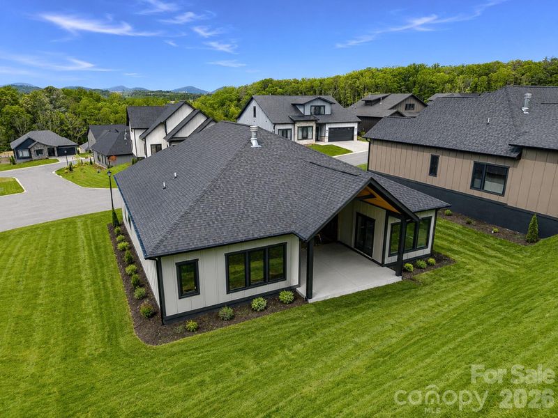 Exterior details and patio area of a home in , Arden (Image 3).