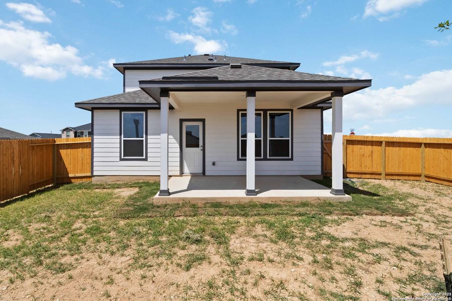 Front exterior of a new home in Hickory Ridge, Elmendorf, TX, highlighting curb appeal (Image 2).