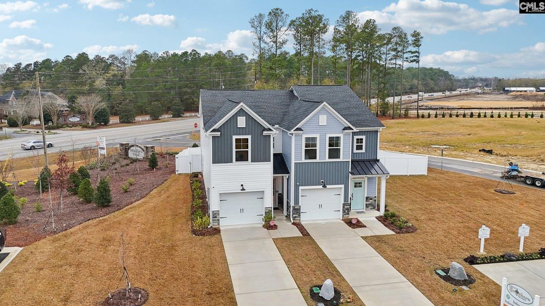 Front exterior of a new home in Walker’s Trail, Lexington, SC, highlighting curb appeal (Image 29). Front exterior of a new home in Walker’s Trail, Lexington, SC, highlighting curb appeal (Image 29).