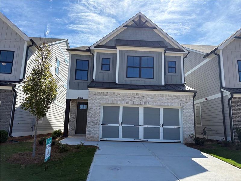 Front exterior of a new home in , Marietta, GA, highlighting curb appeal (Image 15). Front exterior of a new home in , Marietta, GA, highlighting curb appeal (Image 15).