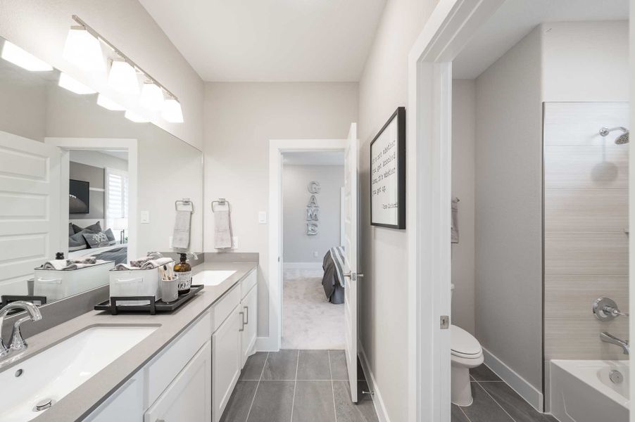 Representative furnished interior of a home built from the Milan by Tri Pointe Homes in Bridgeland, Cypress (Image 52).