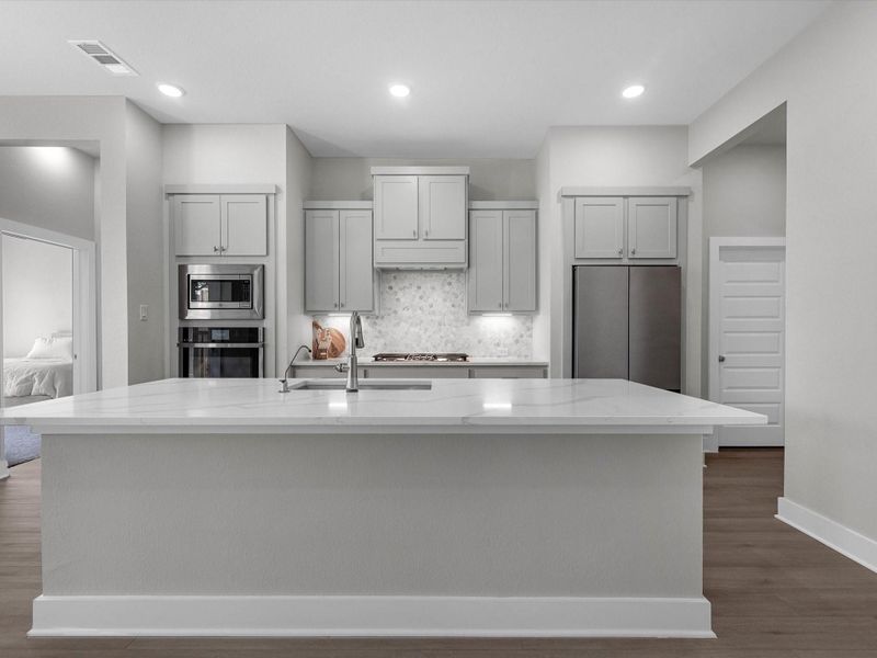 Expansive island with breakfast bar Expansive island with breakfast bar