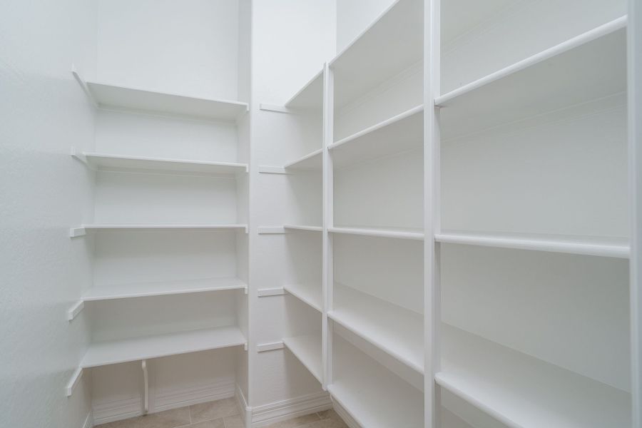 Spacious, unfurnished interior of a new home in Harmony at Montecito in Estrella, Goodyear (Image 21).