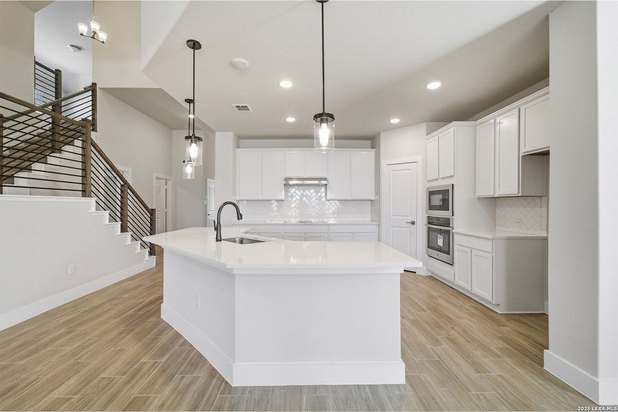 Furnished interior view inside a new home in The Woodlands at Medina Hills, Mico (Image 5).