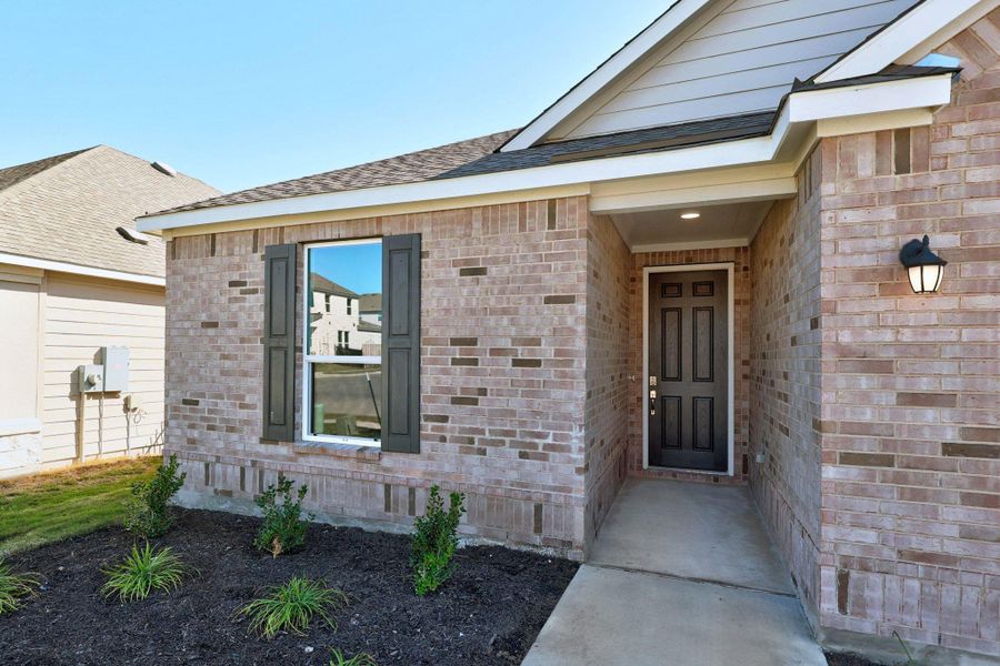 Exterior details and patio area of a home in McKinney Crossing, Austin (Image 18). Exterior details and patio area of a home in McKinney Crossing, Austin (Image 18).