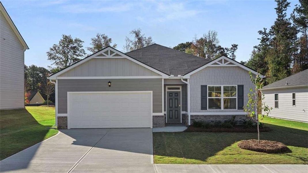 Front exterior of a new home in Cottages at Blue Ridge, Bonaire, GA, highlighting curb appeal (Image 1). Front exterior of a new home in Cottages at Blue Ridge, Bonaire, GA, highlighting curb appeal (Image 1).