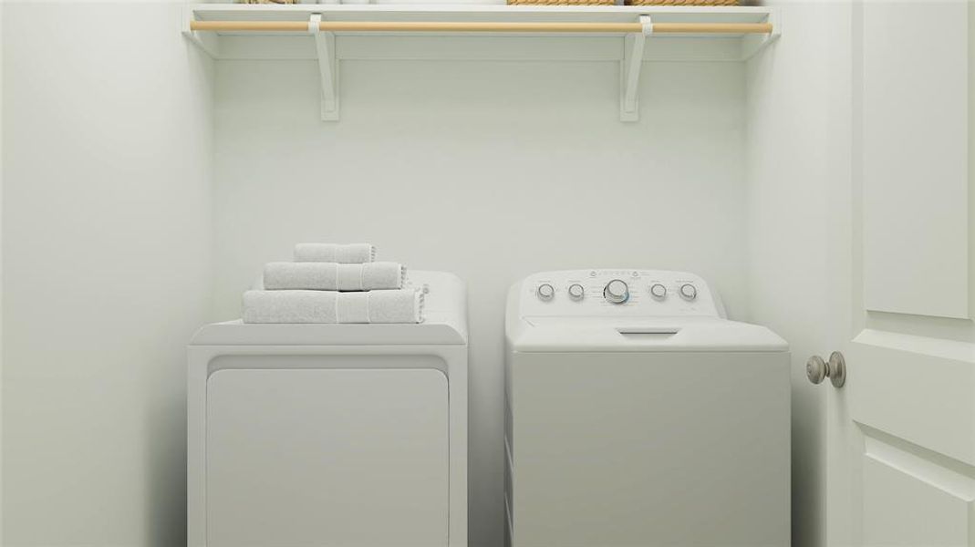 Washroom with washing machine and clothes dryer