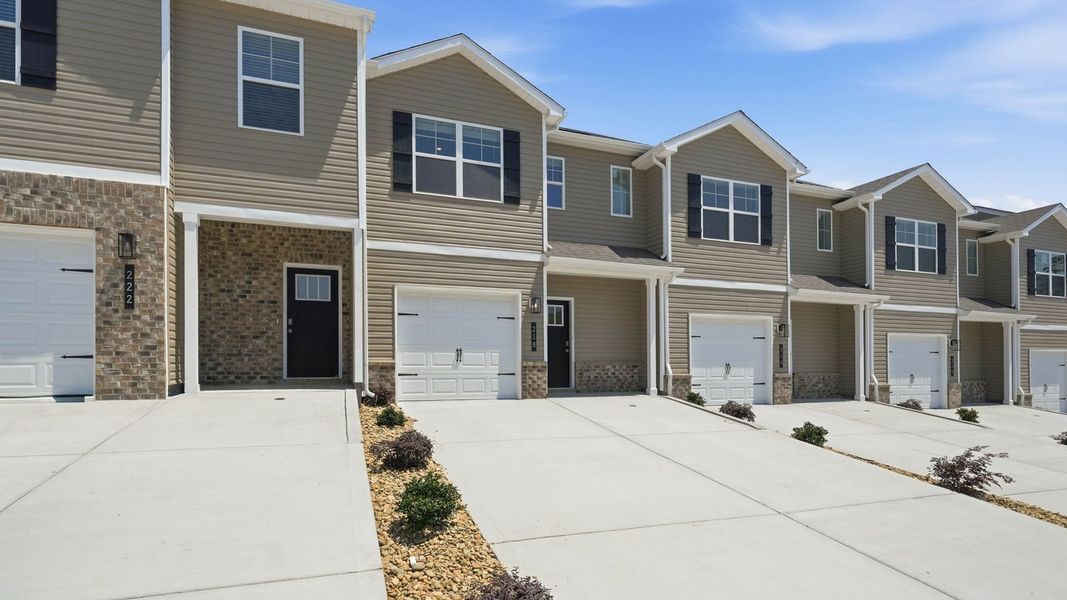 Front exterior of a new home in Cherokee Crossing, Kodak, TN, highlighting curb appeal (Image 2). Front exterior of a new home in Cherokee Crossing, Kodak, TN, highlighting curb appeal (Image 2).