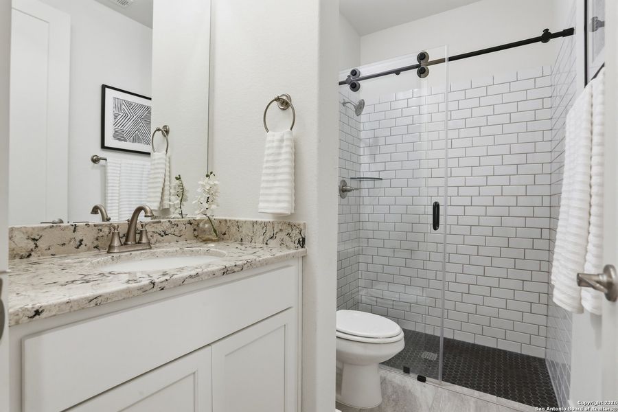 Furnished interior view inside a new home in Kinder Ranch - 70', San Antonio (Image 6).