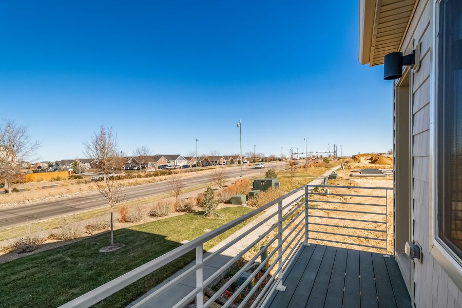 Exterior details and patio area of a home in Reunion, Commerce City (Image 24).