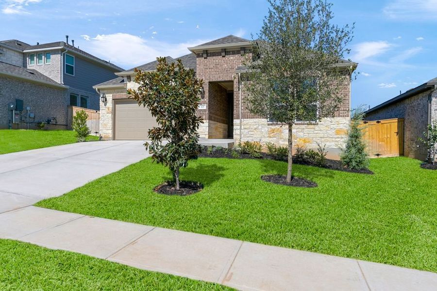 Front exterior of a new home in Nolina 50s, Georgetown, TX, highlighting curb appeal (Image 17).
