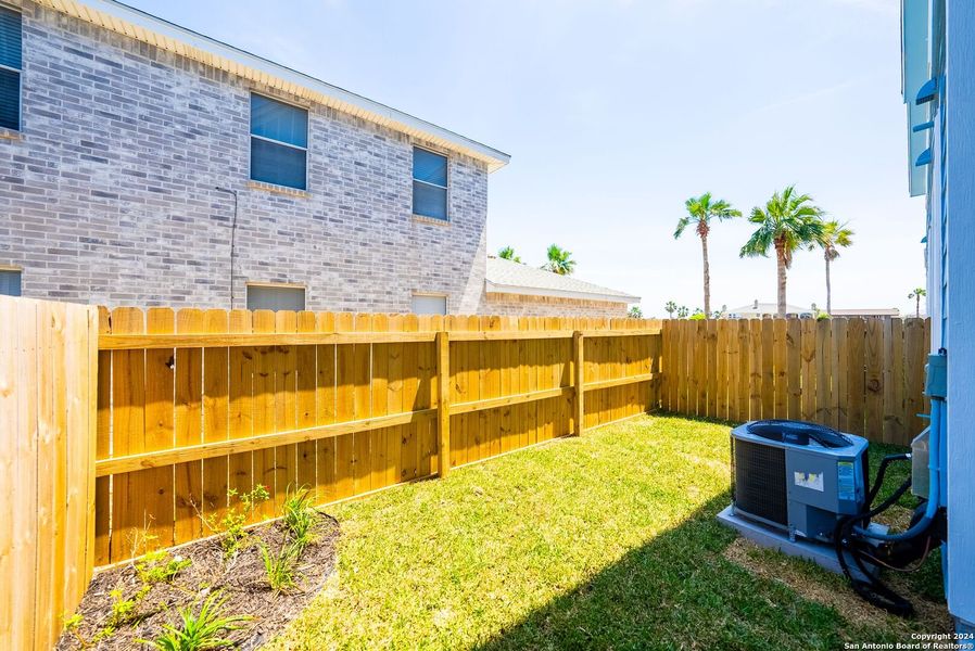 Exterior details and patio area of a home in , Corpus Christi (Image 22).