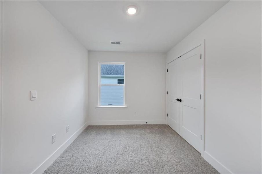 Spacious, unfurnished interior of a new home in Canterbury Villas, Carrollton (Image 30).