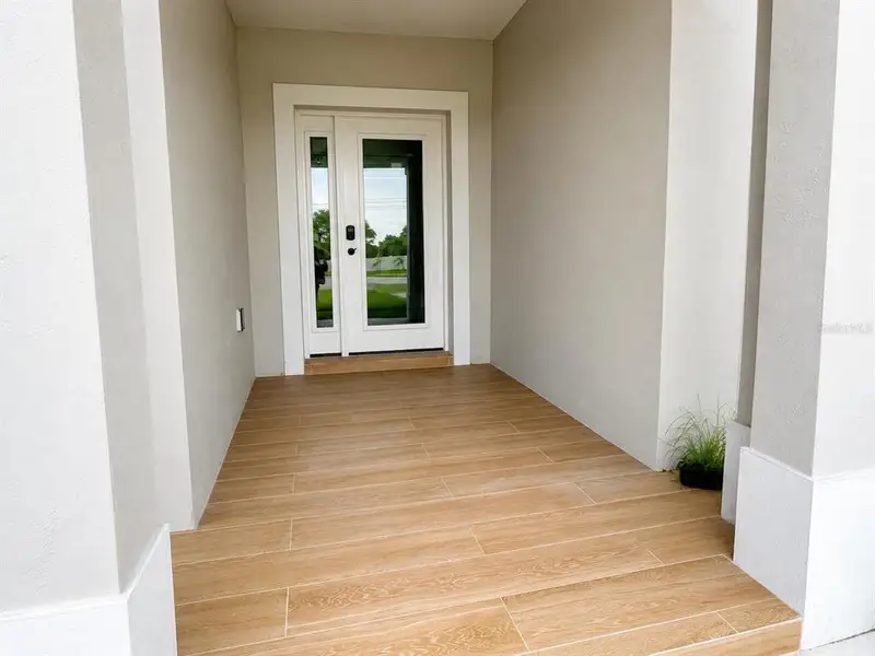 Exterior details and patio area of a home in , Spring Hill (Image 3).