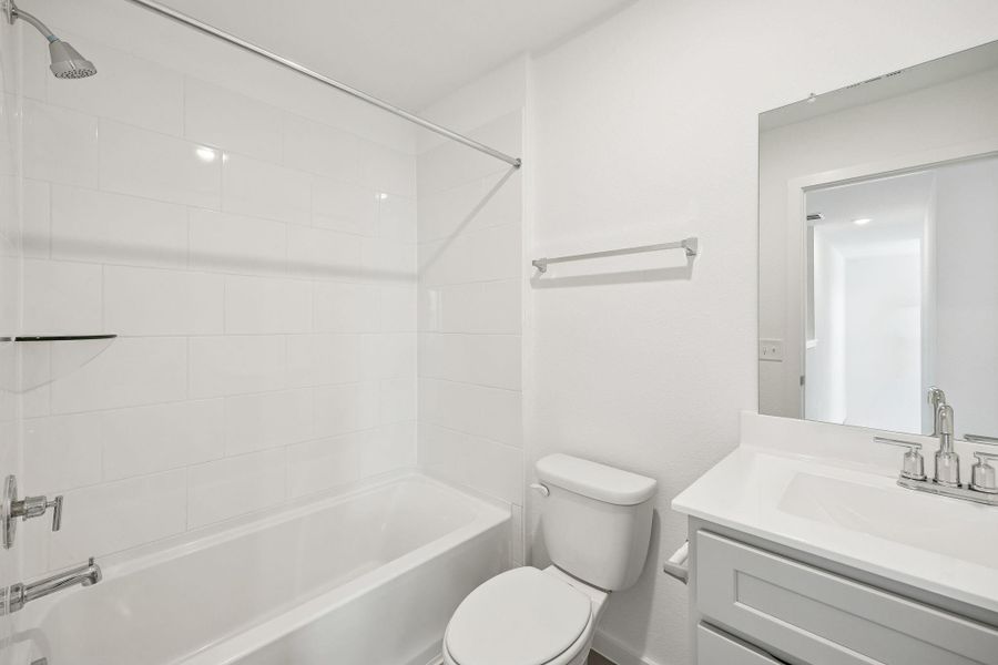 Furnished interior view inside a new home in Decker Farms, Magnolia (Image 11).