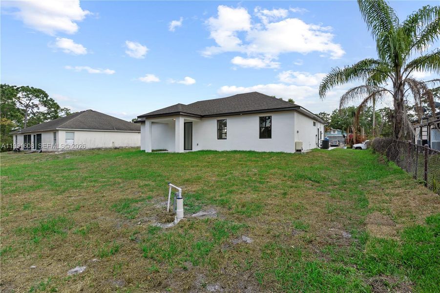 Exterior details and patio area of a home in , Lehigh Acres (Image 4). Exterior details and patio area of a home in , Lehigh Acres (Image 4).