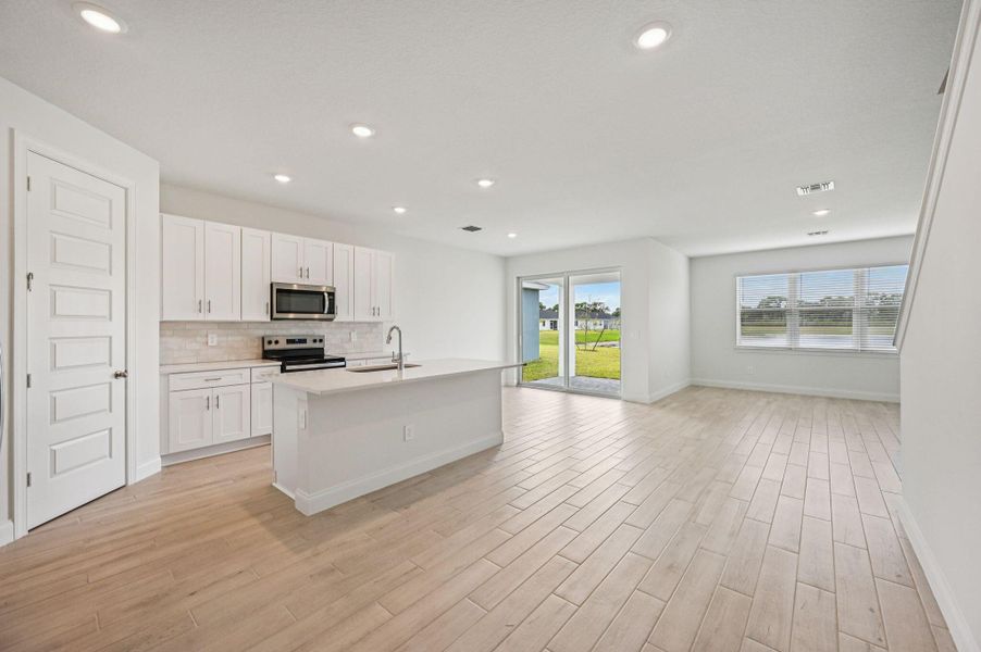 Furnished interior view inside a new home in Brystol at Wylder - Reserve Series, Port St. Lucie (Image 8).