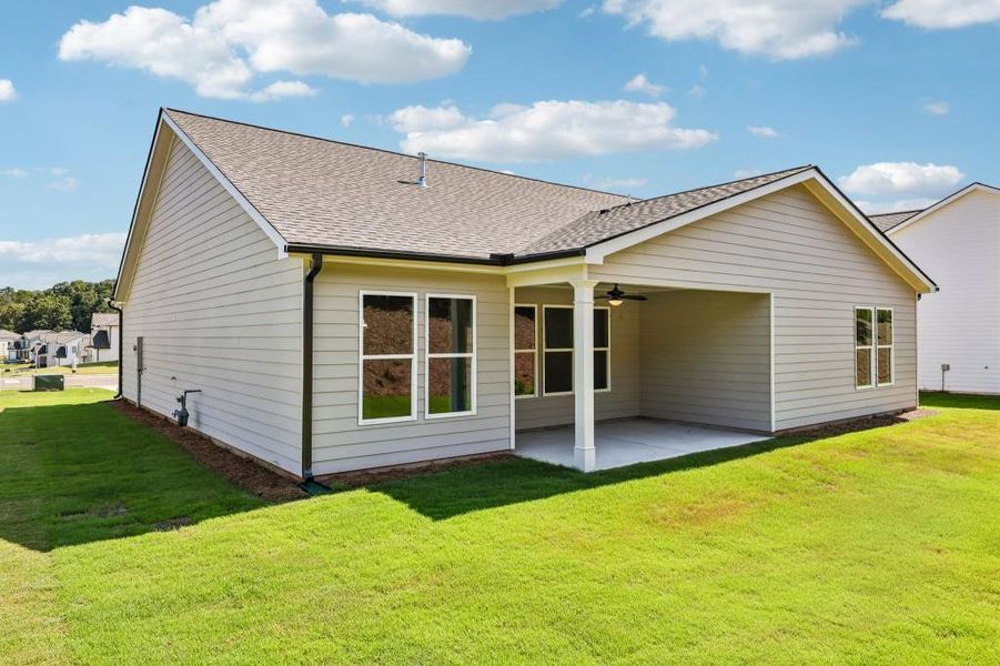 Exterior details and patio area of a home in Sutton’s Landing, Statham (Image 23).
