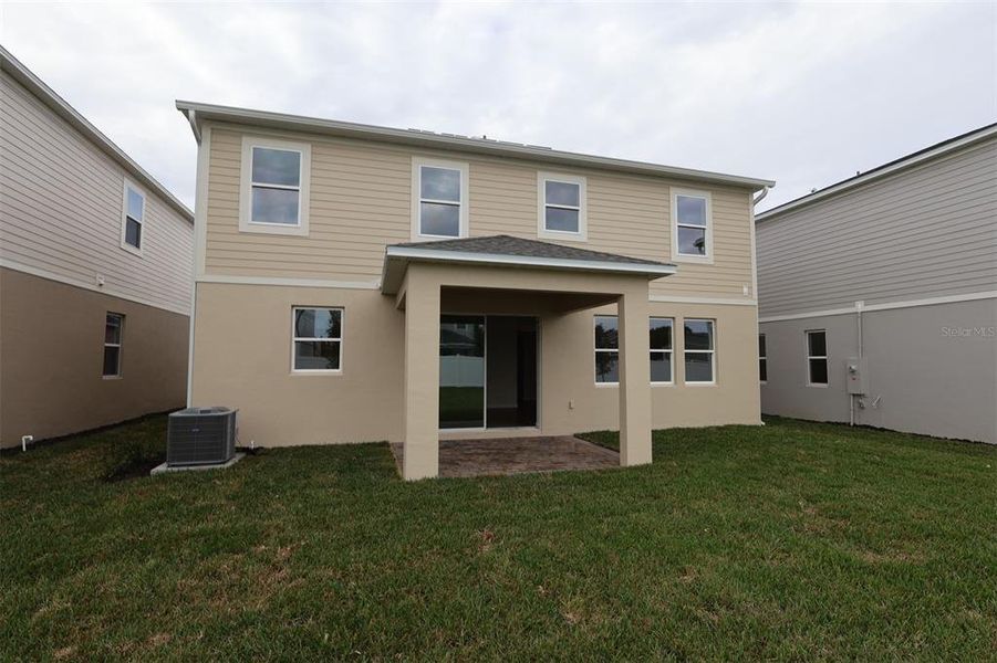 Exterior details and patio area of a home in Estates at Rivercrest, Sanford (Image 4). Exterior details and patio area of a home in Estates at Rivercrest, Sanford (Image 4).