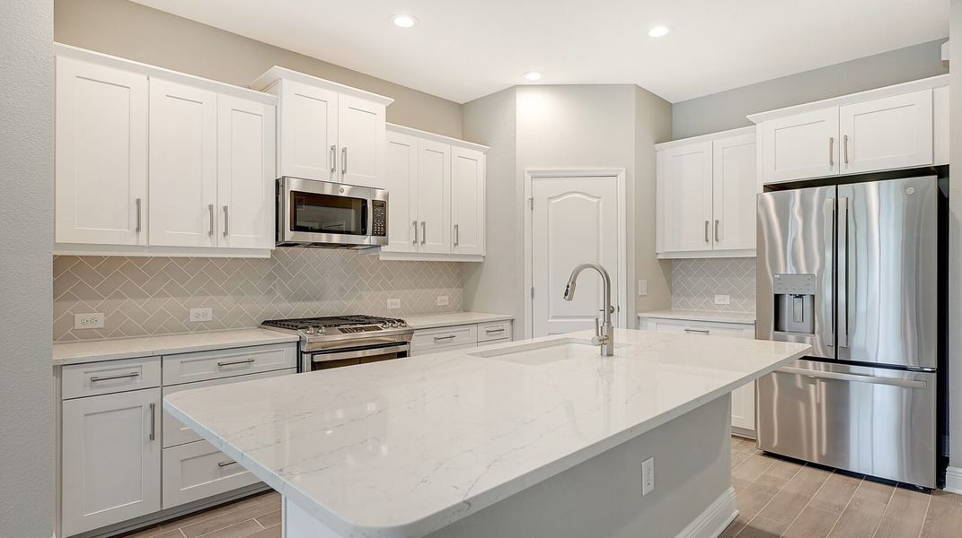 Furnished interior view inside a new home in Boca Royale Golf and Country Club at Wellen Park, Englewood (Image 9).