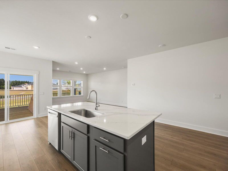 Furnished interior view inside a new home in The Coves at Lakes of Cane Bay, Summerville (Image 8). Furnished interior view inside a new home in The Coves at Lakes of Cane Bay, Summerville (Image 8).