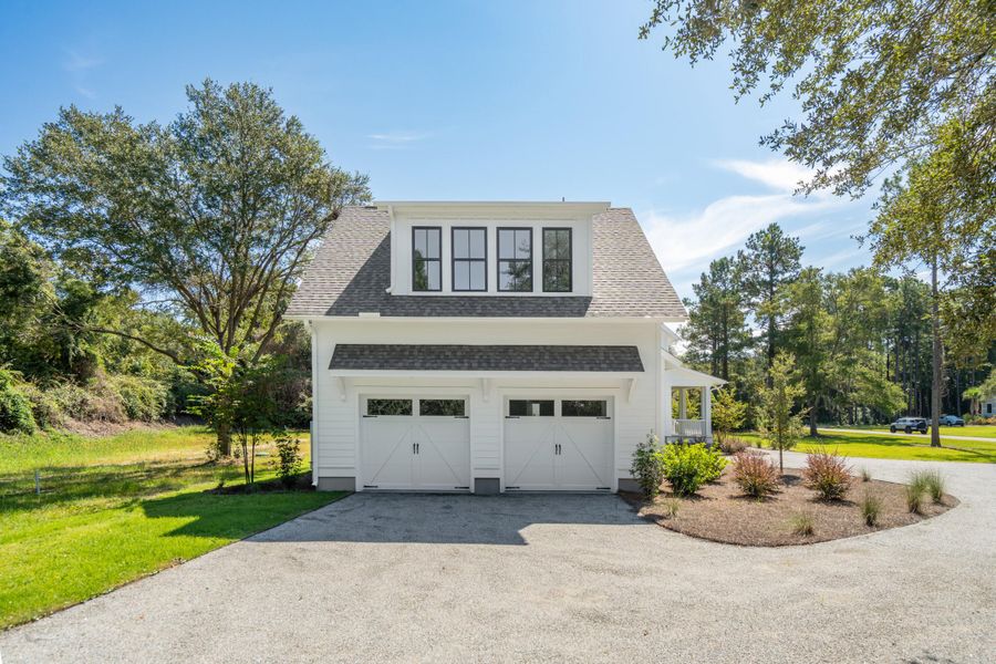 Front exterior of a new home in , Johns Island, SC, highlighting curb appeal (Image 32).