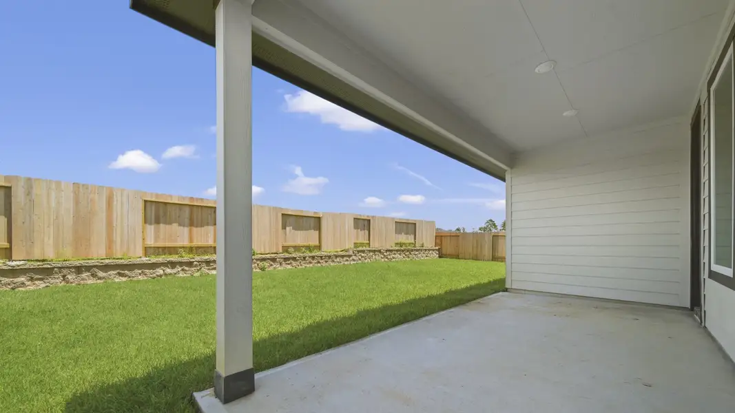 Exterior details and patio area of a home in Mill Creek Estates, Magnolia (Image 4). Exterior details and patio area of a home in Mill Creek Estates, Magnolia (Image 4).