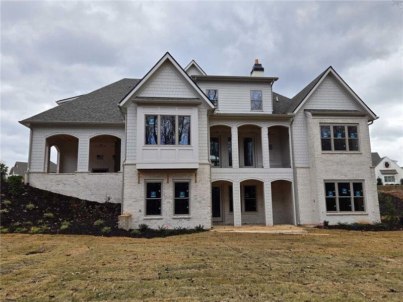 Front exterior of a new home in , Flowery Branch, GA, highlighting curb appeal (Image 5).