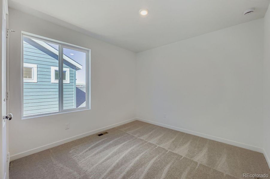 Spacious, unfurnished interior of a new home in Percheron: The Explorer Collection, Colorado Springs (Image 10).