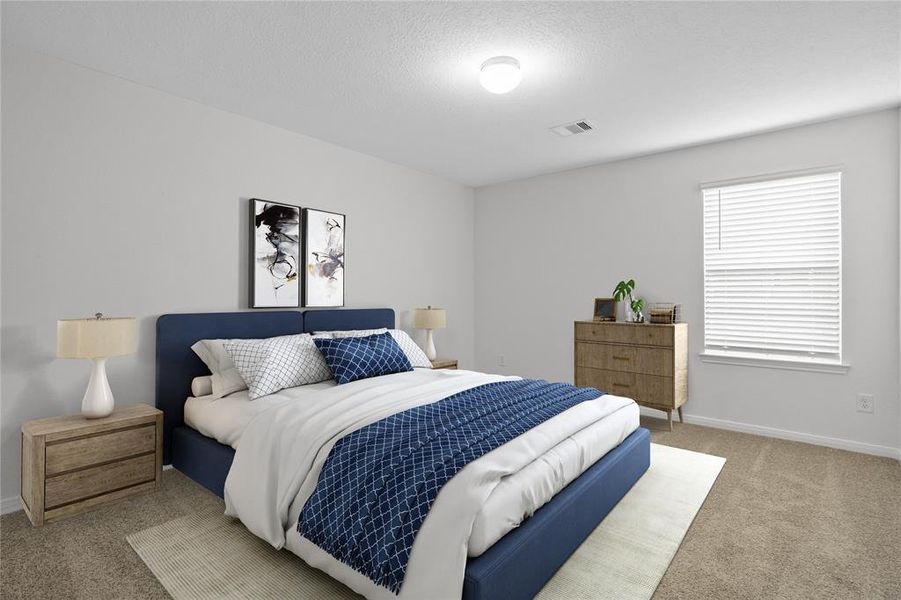 Secondary bedroom features plush carpet, neutral paint, lighting, large window with privacy blinds and ample sized closet space.