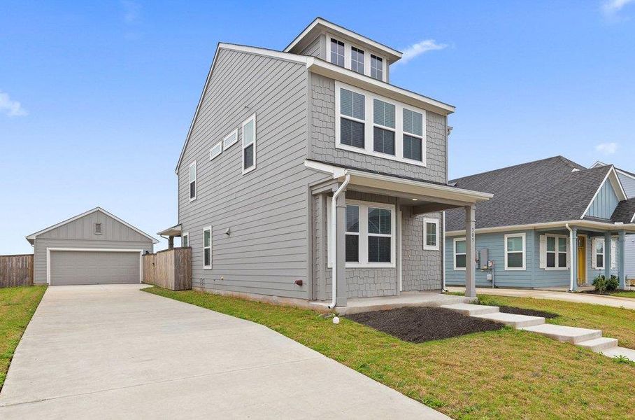 Front exterior of a new home in Castlewood, Taylor, TX, highlighting curb appeal (Image 21).