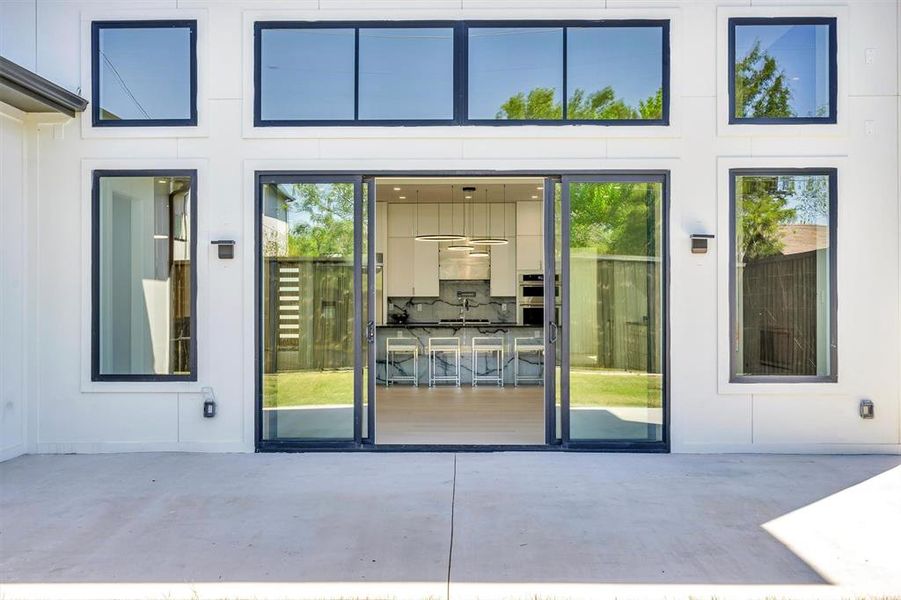 Doorway to property with a patio
