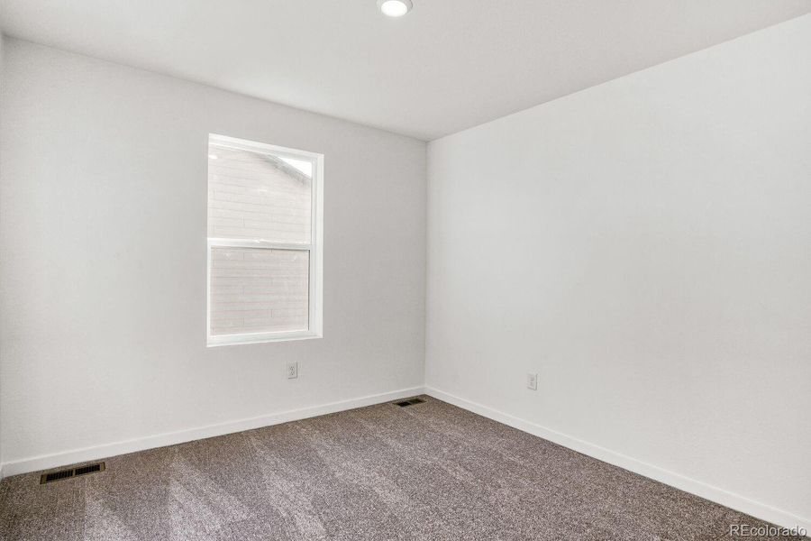 Spacious, unfurnished interior of a new home in Muegge Farms, Bennett (Image 10).