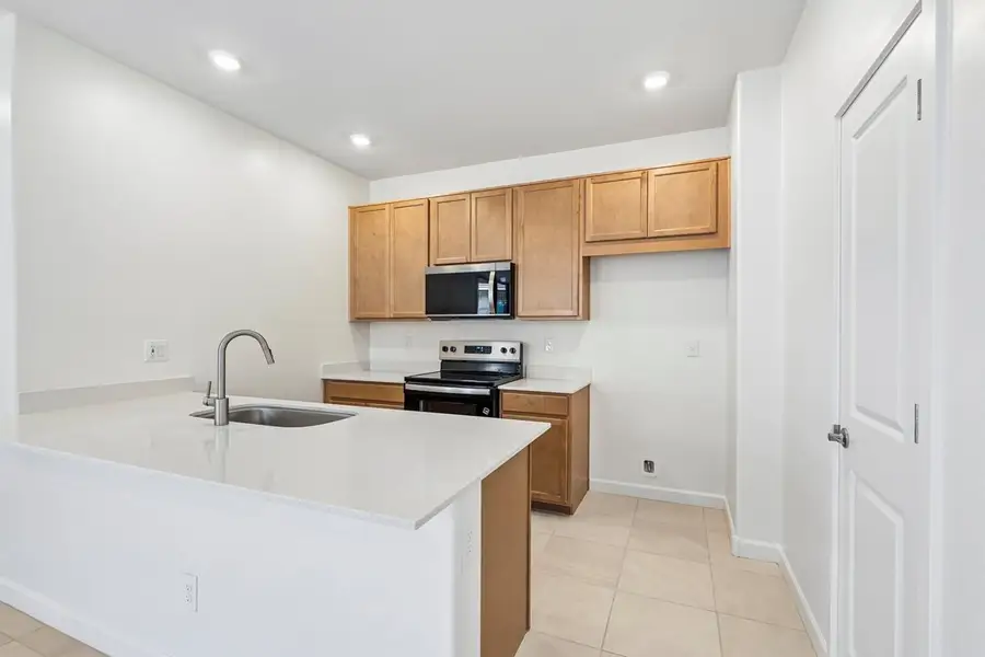 Furnished interior view inside a new home in Mandarina Reserve, Marana (Image 4).