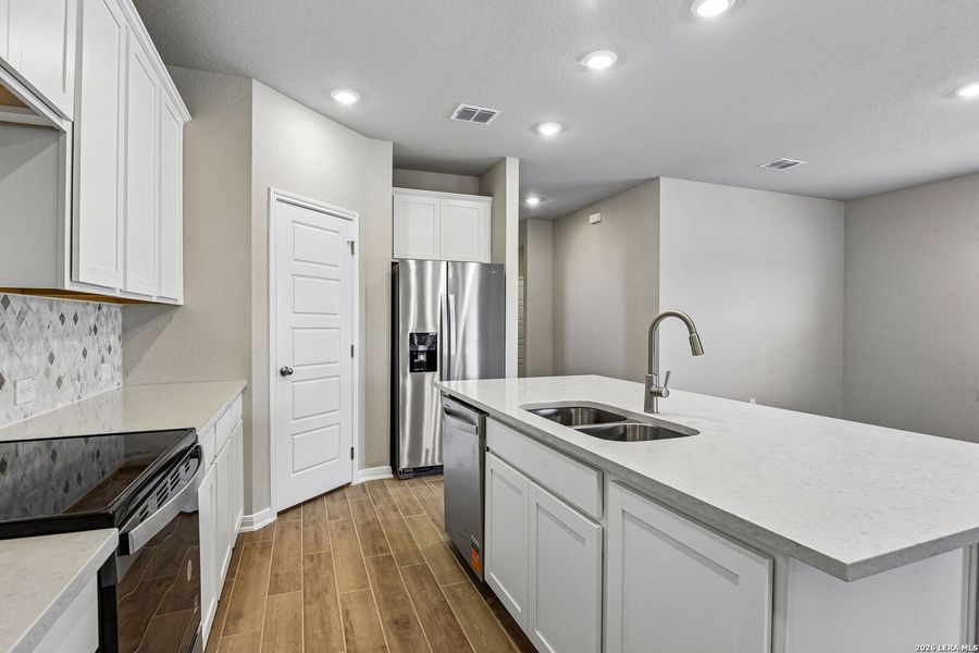 Furnished interior view inside a new home in Royal Crest, San Antonio (Image 6).