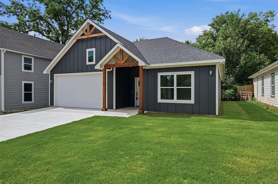 Front exterior of a new home in , Denison, TX, highlighting curb appeal (Image 2). Front exterior of a new home in , Denison, TX, highlighting curb appeal (Image 2).