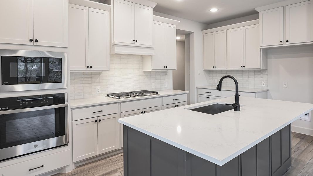 Furnished interior view inside a new home in 6 Creeks, Kyle (Image 6).