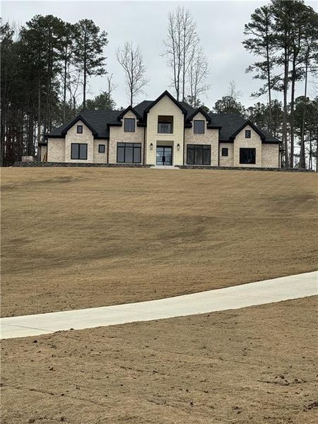 Front exterior of a new home in , Dacula, GA, highlighting curb appeal (Image 2). Front exterior of a new home in , Dacula, GA, highlighting curb appeal (Image 2).