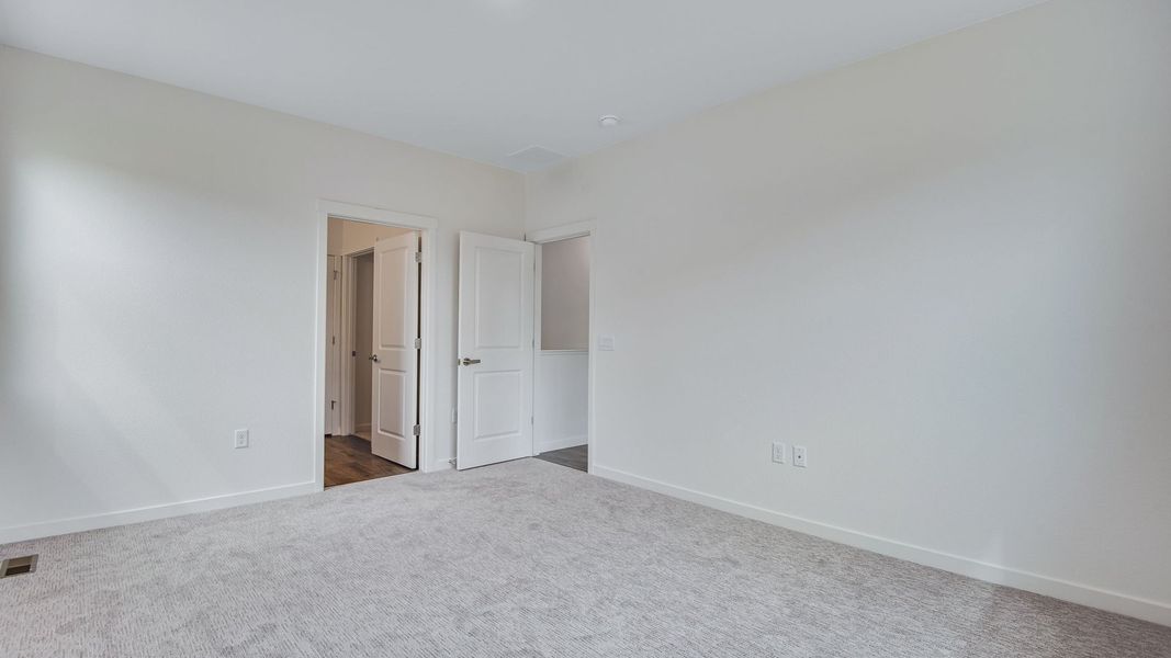 Spacious, unfurnished interior of a new home in Trails at Crowfoot, Parker (Image 14). Spacious, unfurnished interior of a new home in Trails at Crowfoot, Parker (Image 14).