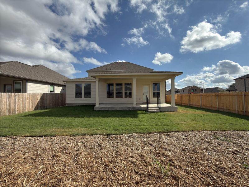 Exterior details and patio area of a home in River Bluff, Leander (Image 22).